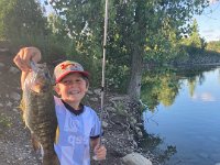 Nicholas with his NEW Rod and Reel and a HUGE Smallmouth Bass on a piece of HOT DOG! YES HOT DOG! Who Da MAN! NIKO'S DA MAN!